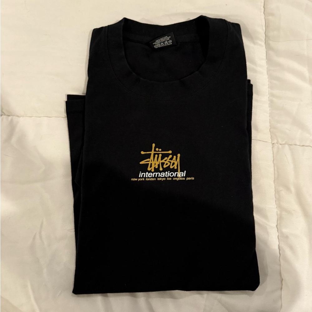 New Stussy Intl Men’s Tee 
Size Medium
Black shirt with logo on front
